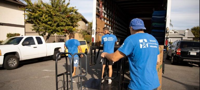 movers loading a moving truck 