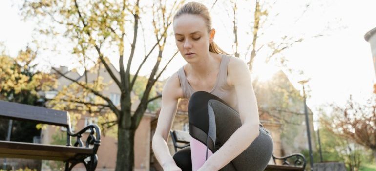 Woman exercising in a park