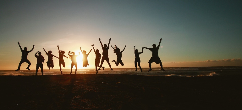 a group of friends jumping in the air