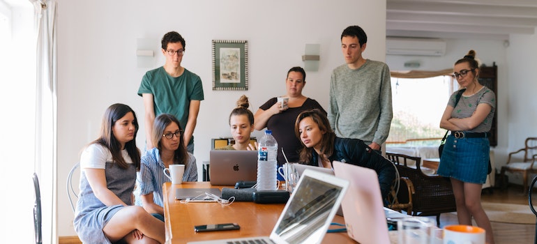 A group of young people working in the office.