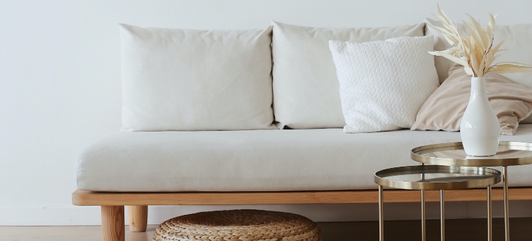 white sofa with pillows