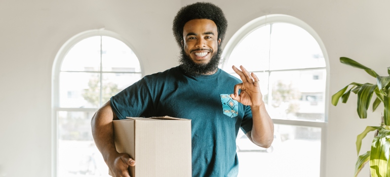 happy guy explaining how to help your Austin movers