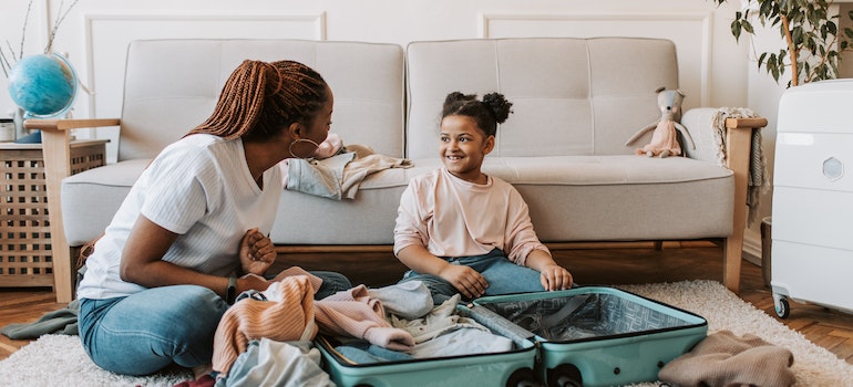 Mother and daughter packing