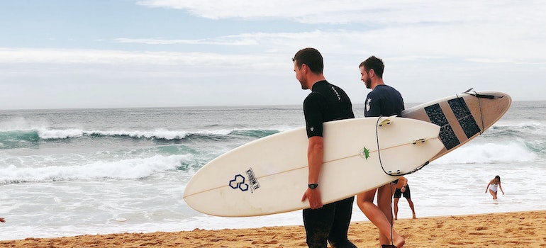 Surfest enjoying waves in San Clemente, one of the 10 must-see cities in the West Coast