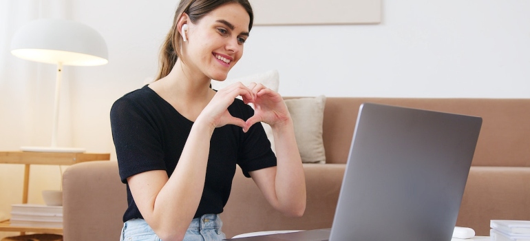 The girl talking via video call after moving from LA