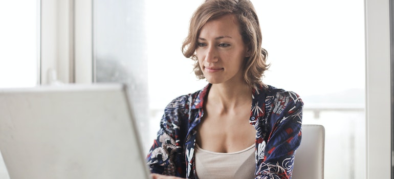 A woman booking movers in Austin