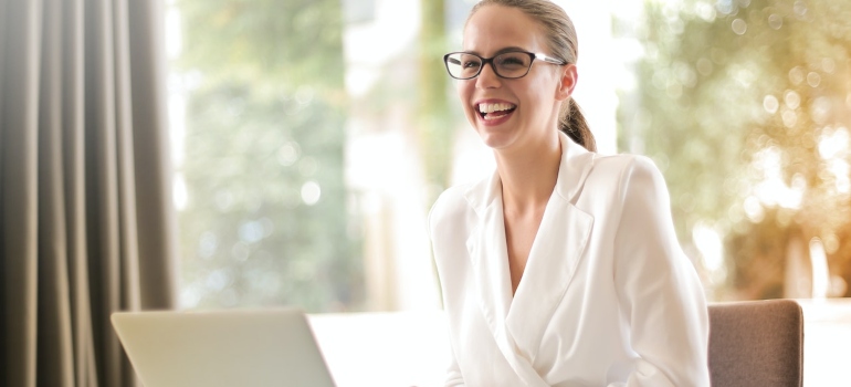 A woman searching the net to find out where do young adults live in Austin