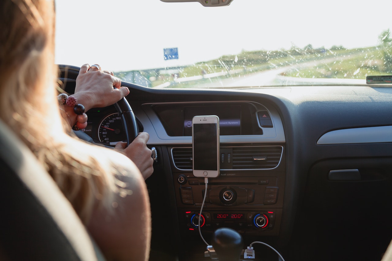 Picture of a person driving a car